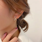 Exclusive Silver Cross Stud Earrings Women — White Gold Color — Size 925 Silver — Lifestyle View