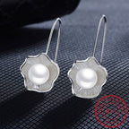 Exclusive Ladies Silver Pearl Lotus Earrings — Silver lotus — Front View