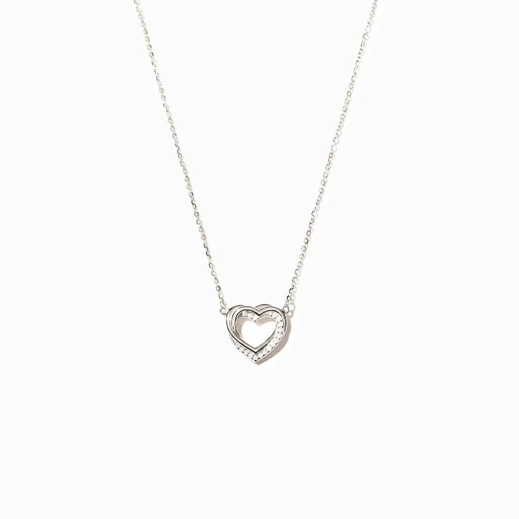 Exclusive Overlapping Double Hollow Heart Necklace — White Gold Color — Size 925 Silver — Detail View
