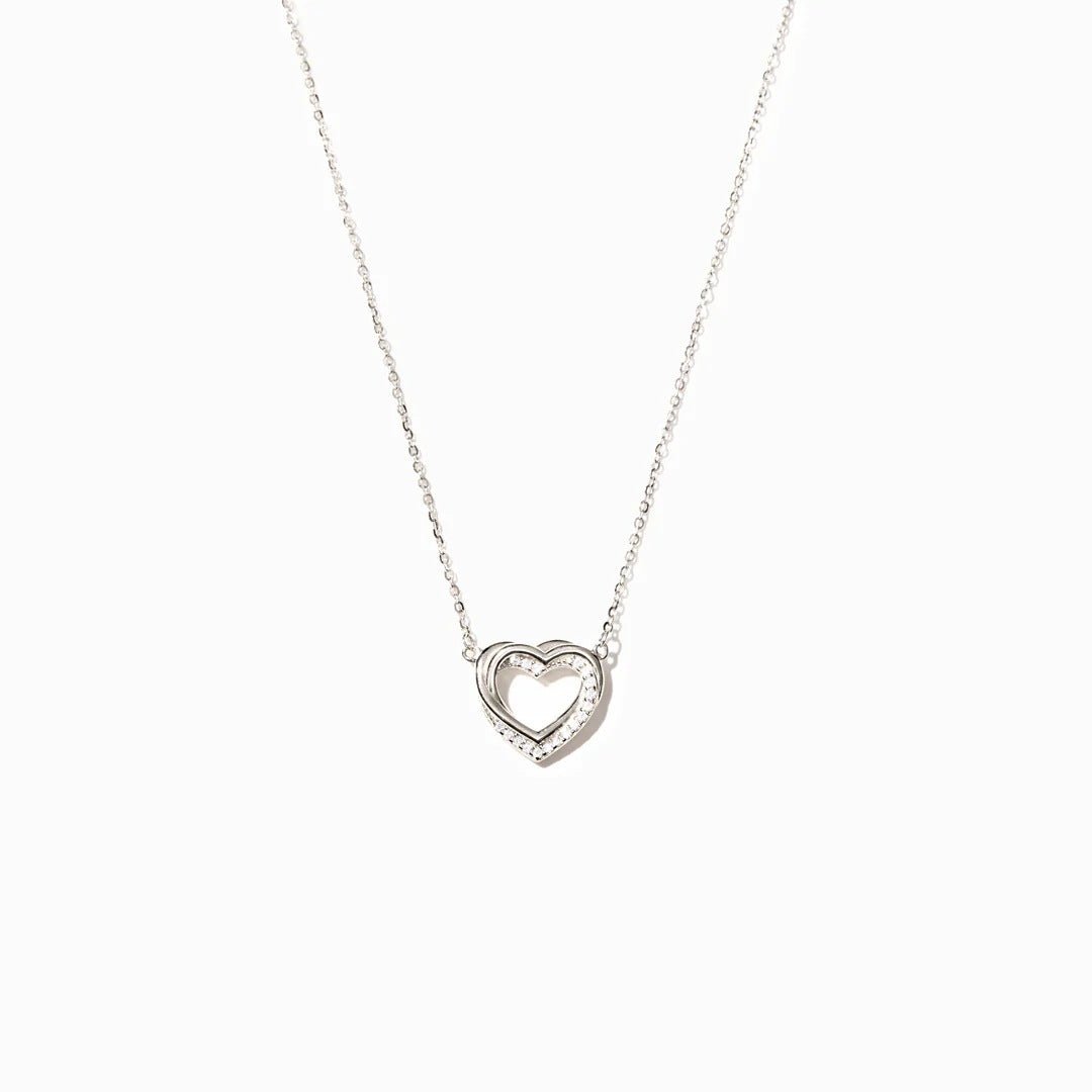 Exclusive Overlapping Double Hollow Heart Necklace — White Gold Color — Size 925 Silver — Detail View
