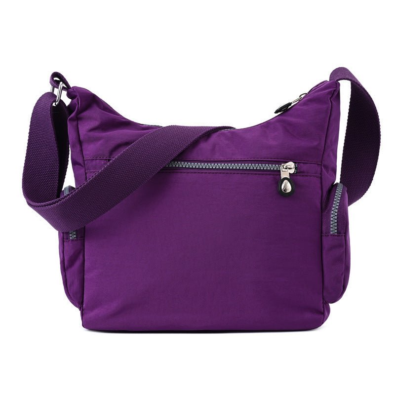 Exclusive Multiple Pockets Waterproof Crossbody Bags — Apricot — Side View